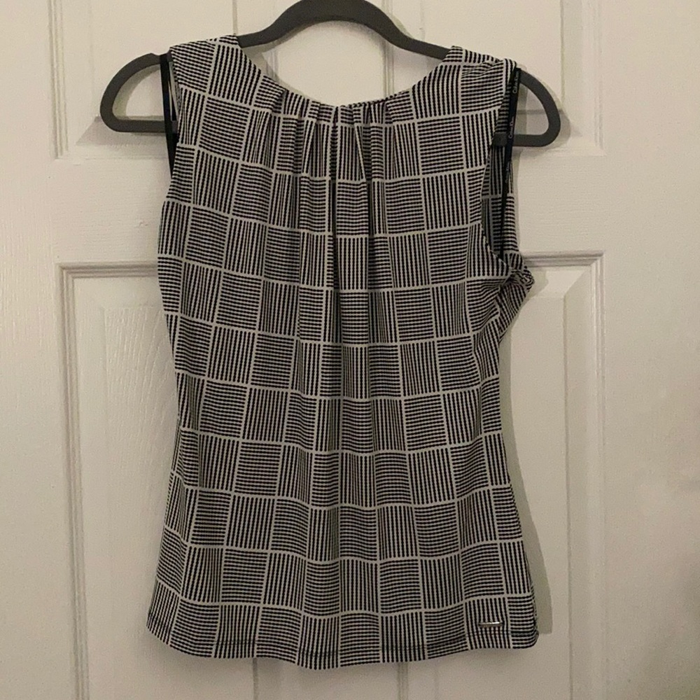 Calvin Klein black and white stripped sleevesless blouse